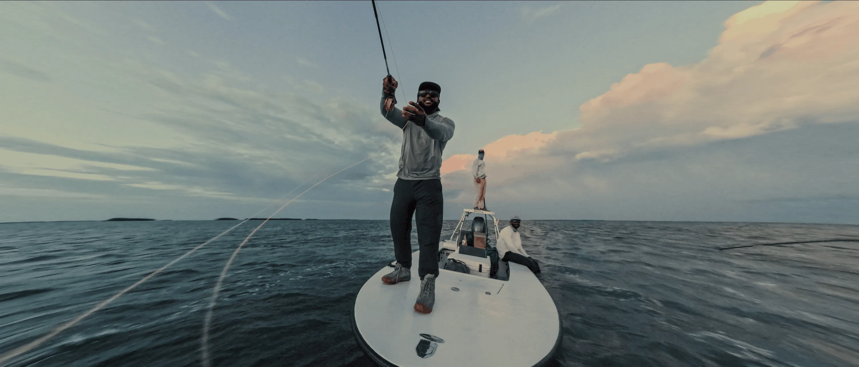 man fishing on a boat