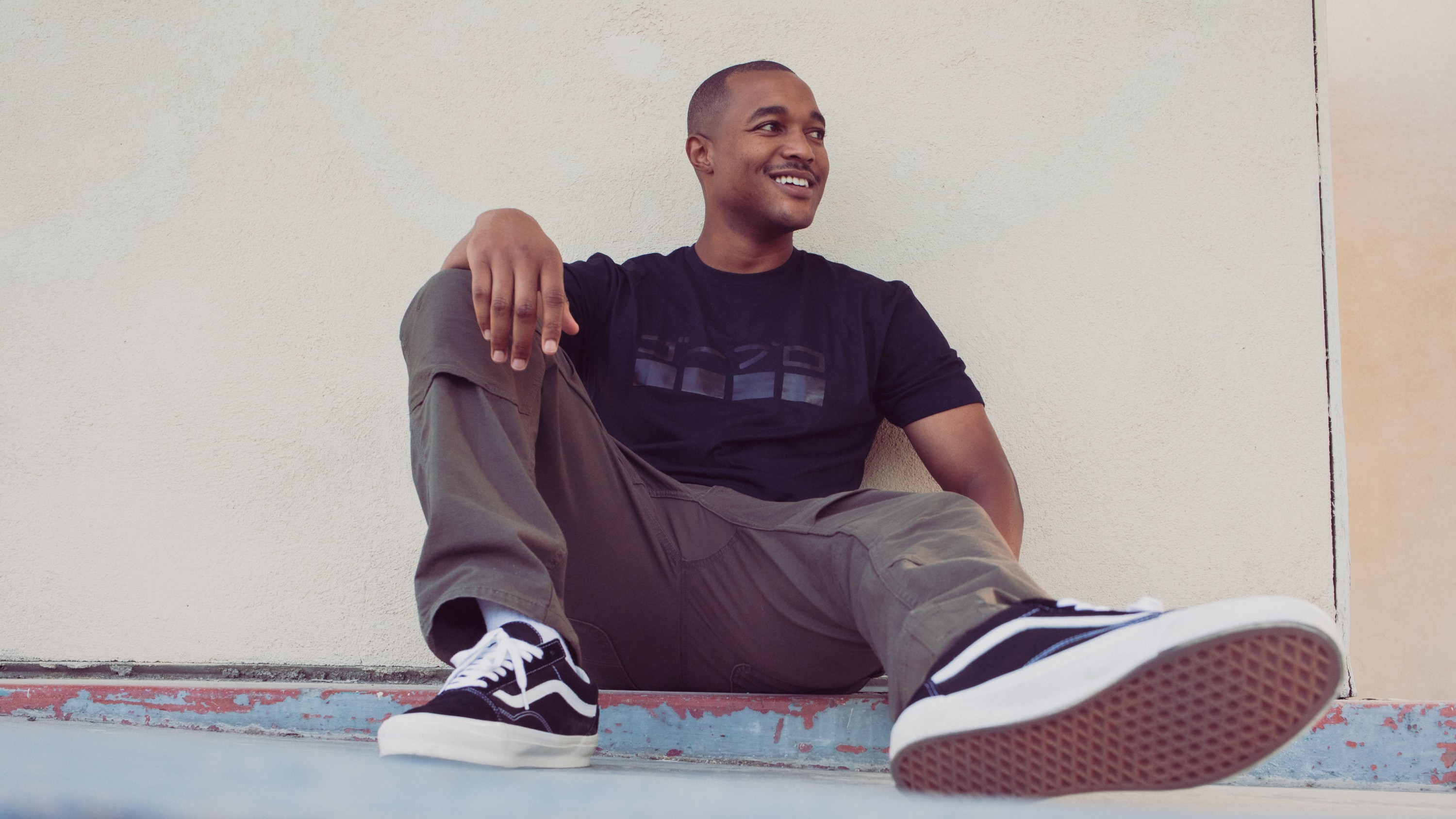 Man wearing GoPro Tokyo Nights – Japanese Logo T-Shirt