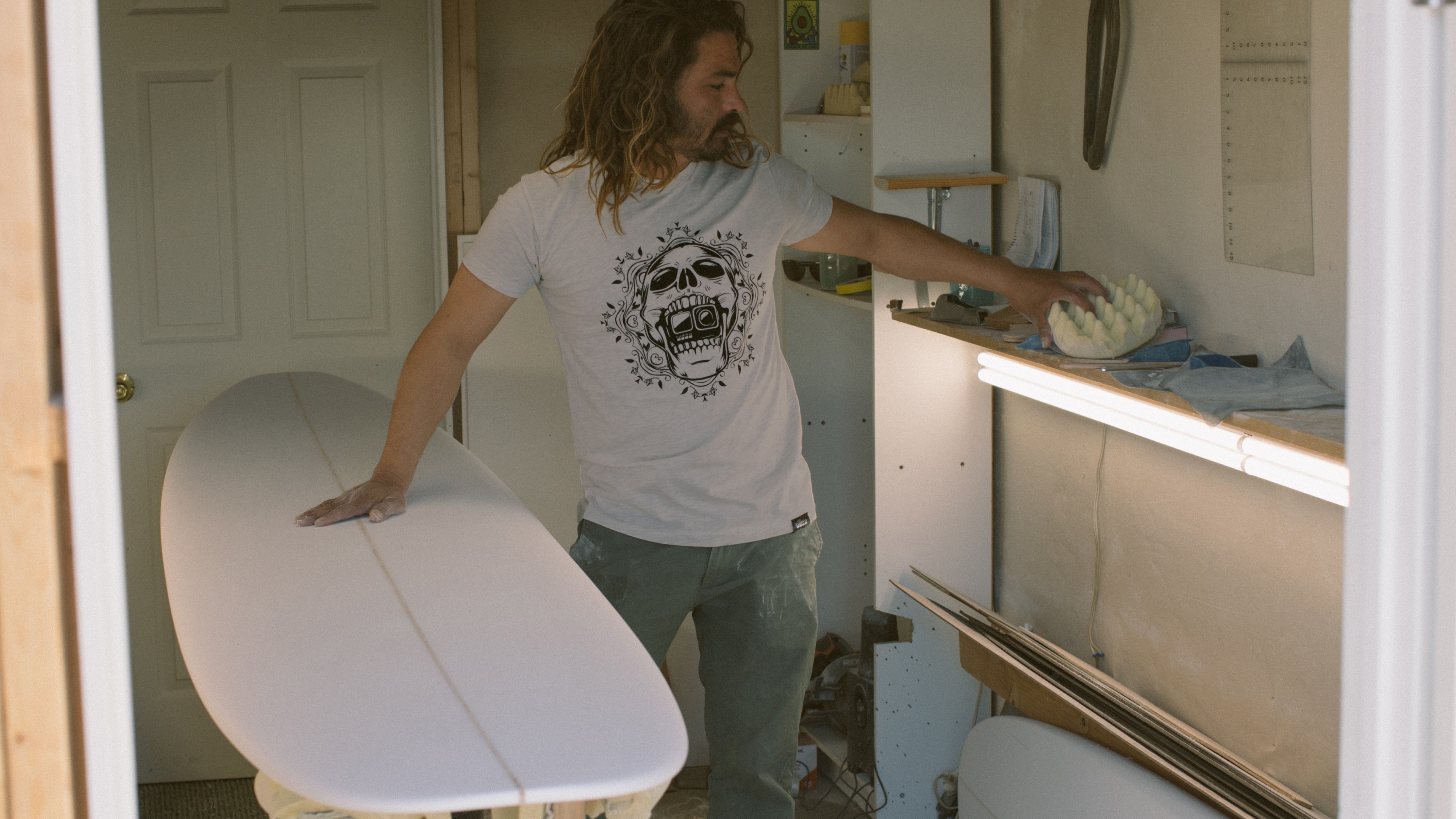 man wearing GoPro Still Rippin' Skull Graphic Tee