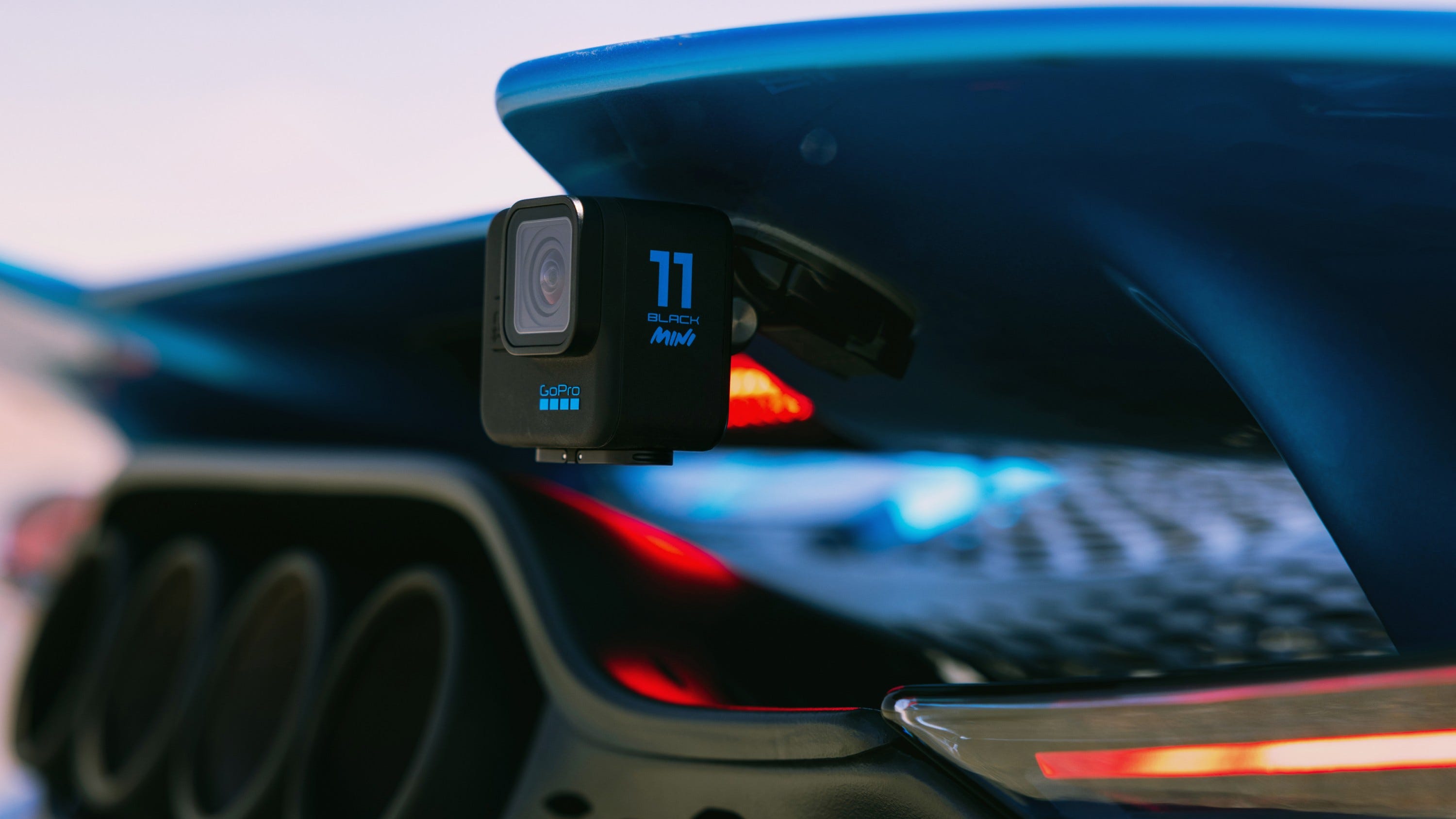 GoPro camera mounted to rear car spoiler with Adhesive Sticky Mount
