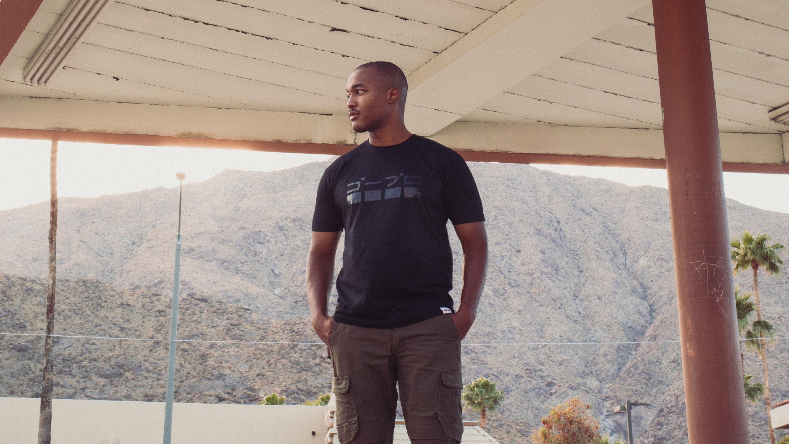 Guy wearing GoPro Tokyo Nights – Japanese Logo T-Shirt