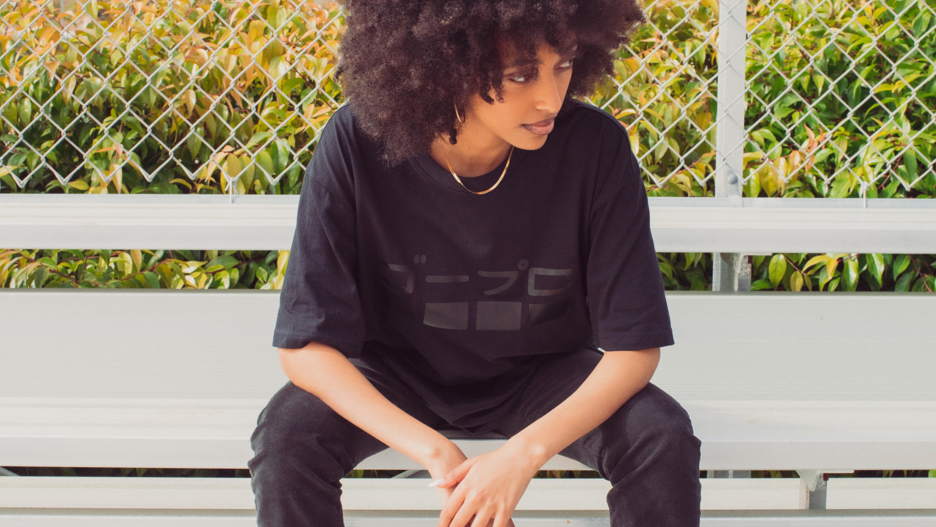 Woman wearing GoPro Tokyo Nights – Japanese Logo T-Shirt