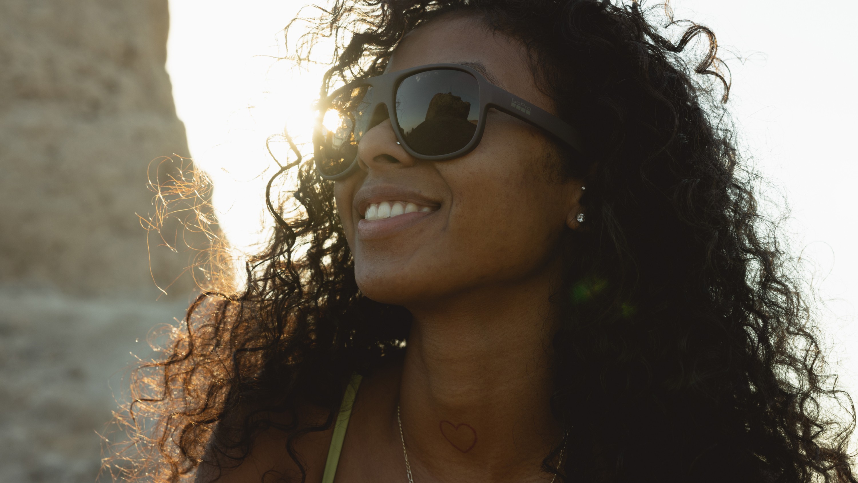 woman wearing GoPro Magnum – Floating Polarized Sunglasses (Retro Style)