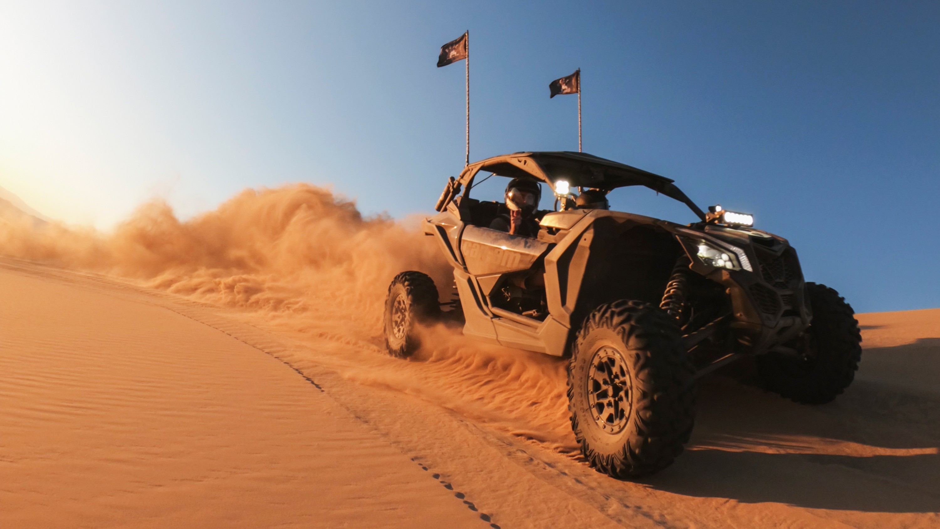 biker midair with GoPro Rollcage Protective Sleeve & Camera Lens Replacement