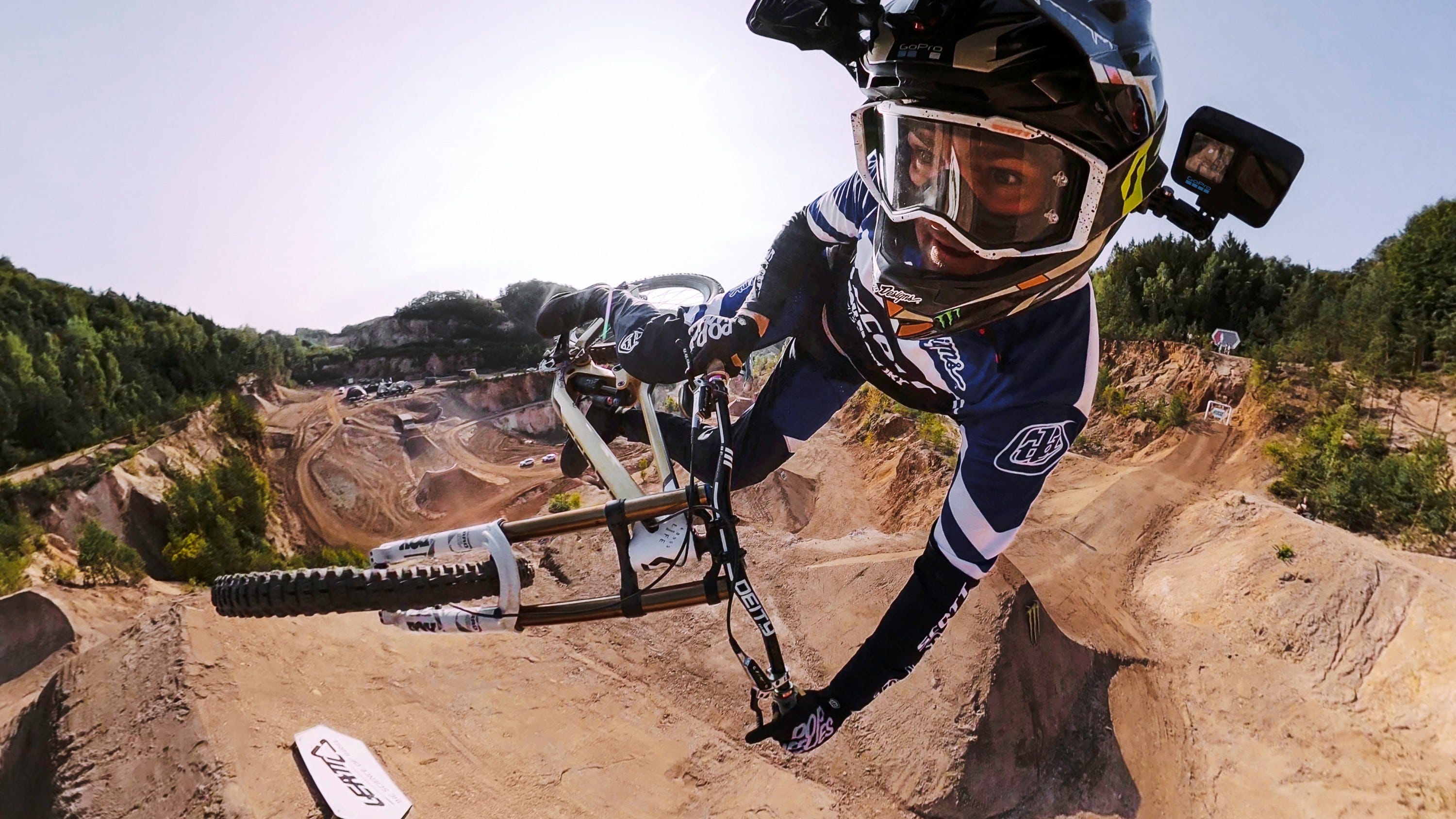 dirt biker with GoPro mounted to side of helmet