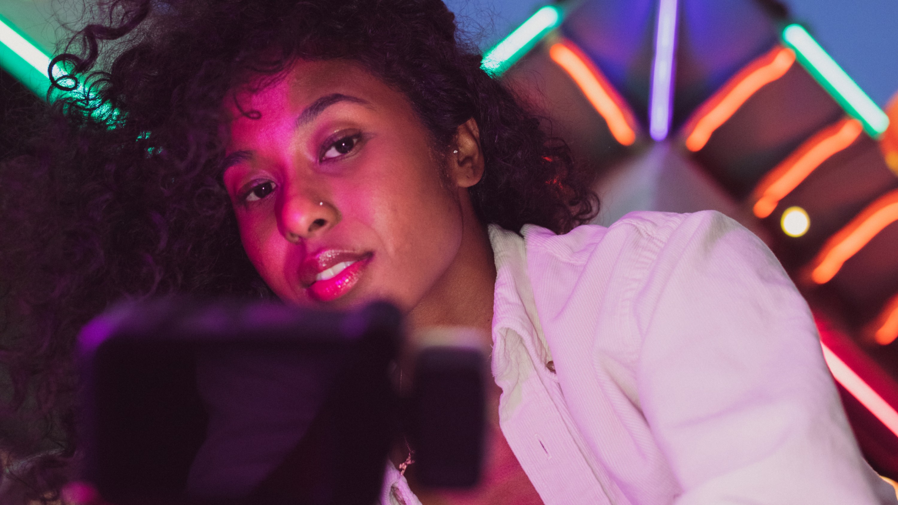 woman recording herself with GoPro HERO11 Black Camera Media Mod